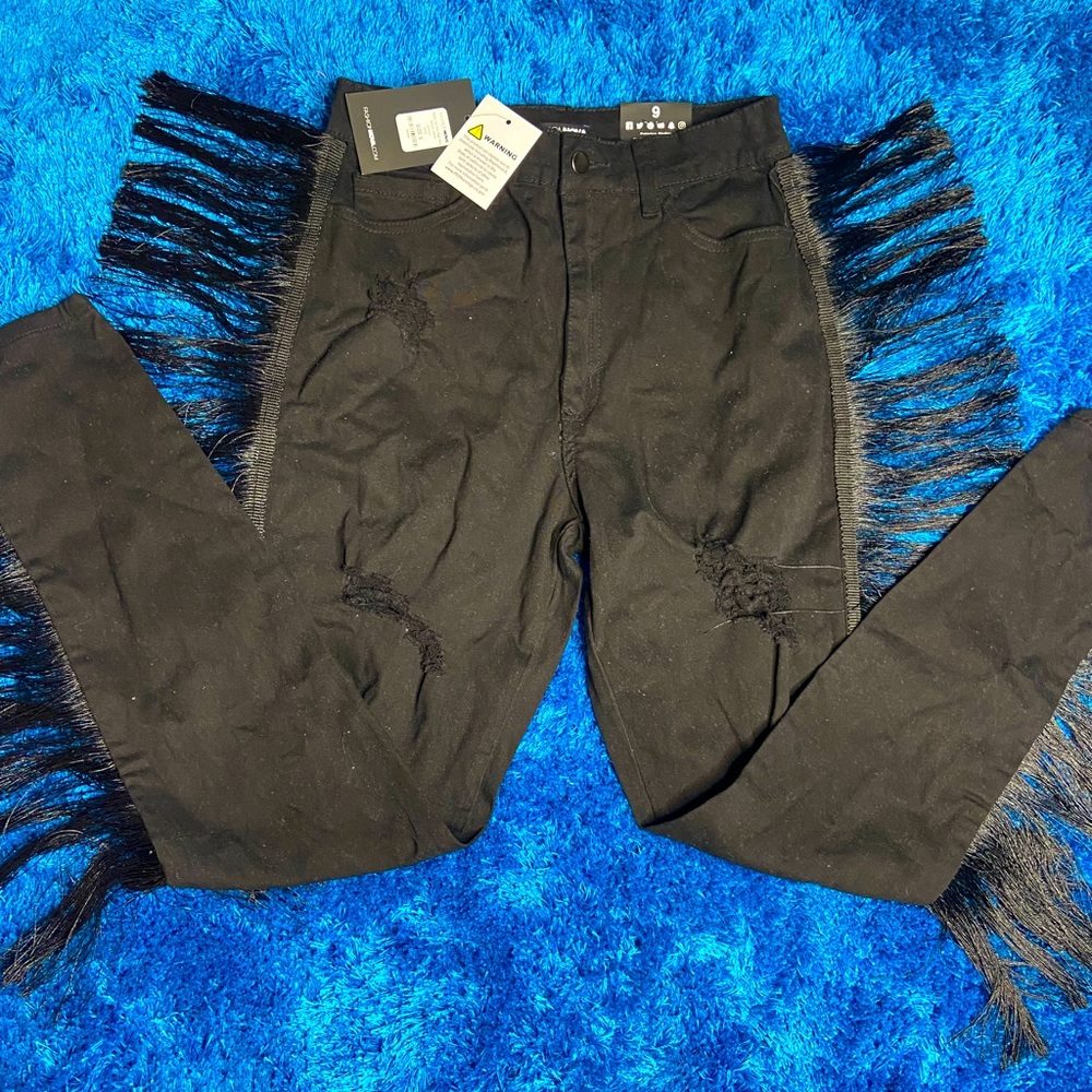 Black ripped jean pants